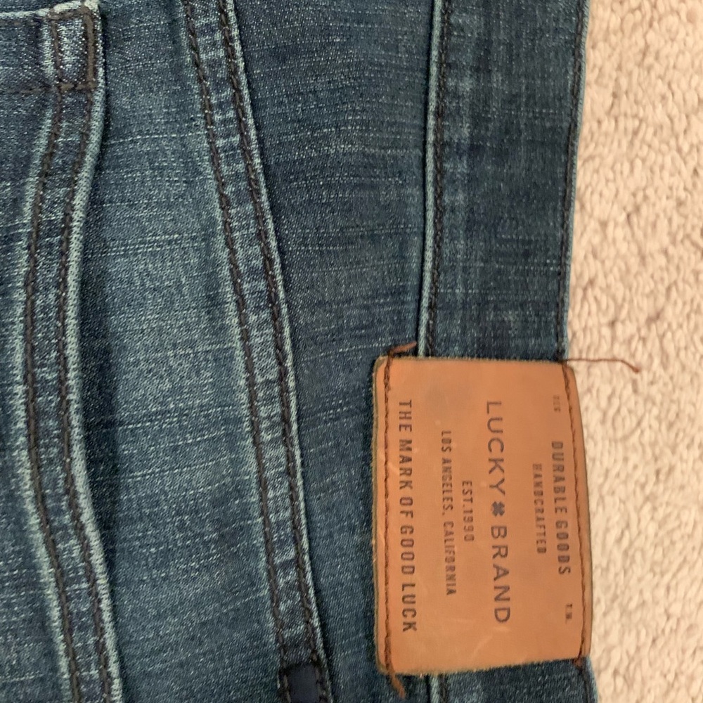 Men’s Lucky Brand dark denim wash colored jeans